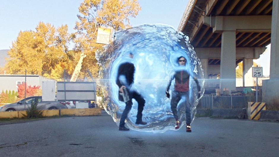 Wells and Cisco step out of the breach on the street.