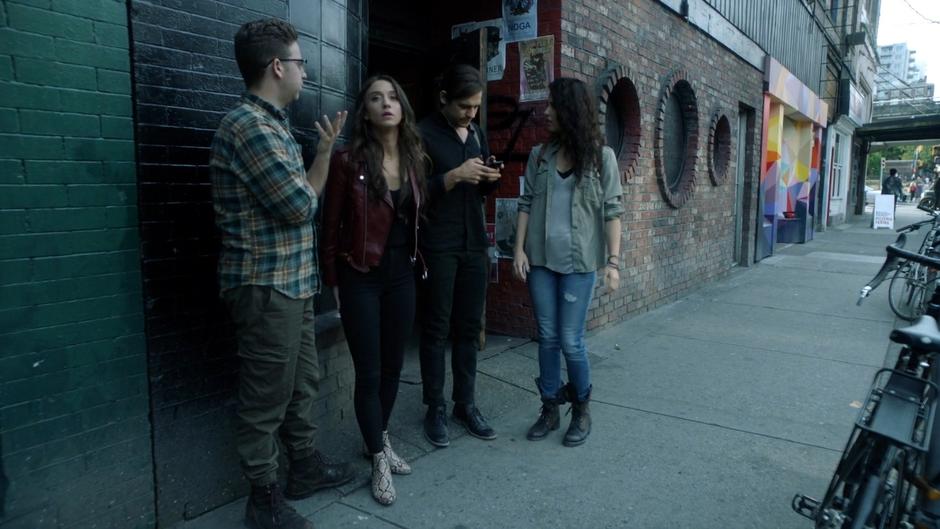 Josh, Julia, Quentin, and Kady gather outside after talking with the bartender.