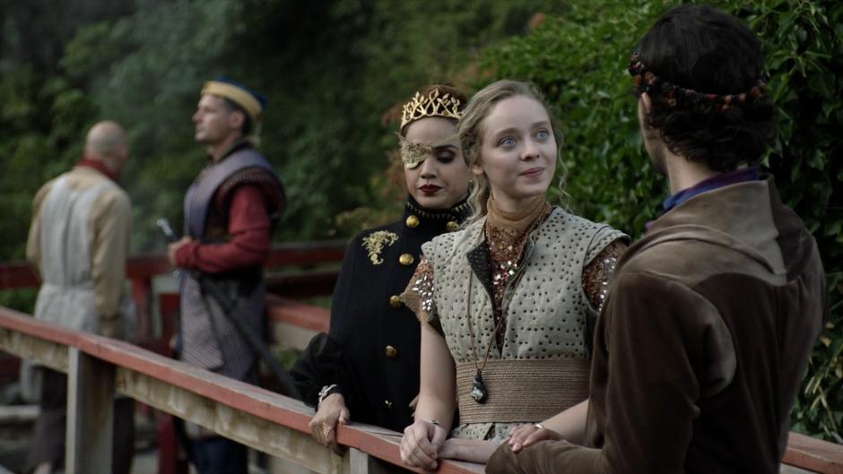 Fray pops up between Margo and Eliot as they talk on the dock.