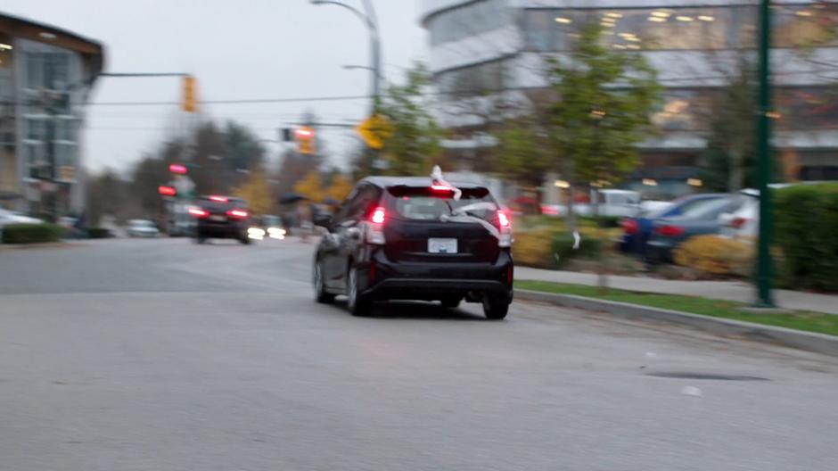 Councilman Grovner's car continues towards the intersection out of control.