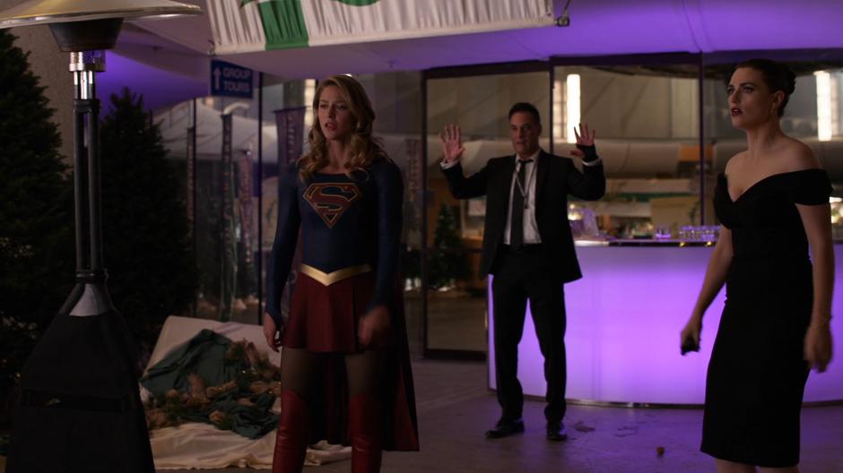 Kara and Lena stand between Lillian and Edge.