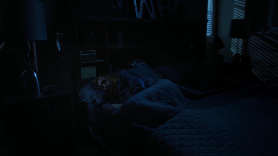 Scully wakes up in a strange bed during her vision.