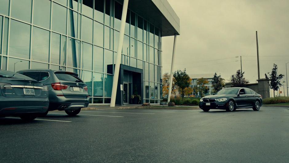 Olivia drives away with Mary in her car.