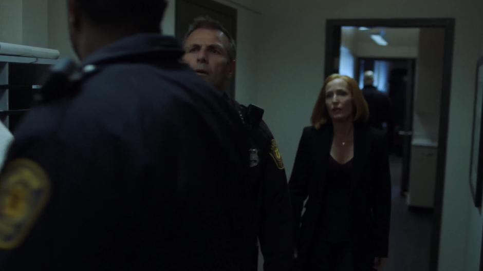 Chief Strong and Scully approach Officer Wentworth to ask where Officer Eggers went.