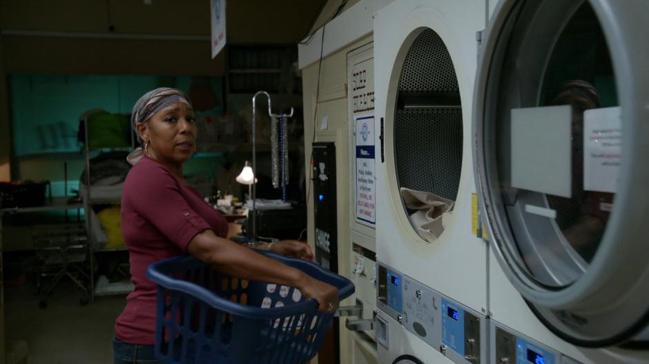 Mama Leone tells Liv her story while doing some laundry.