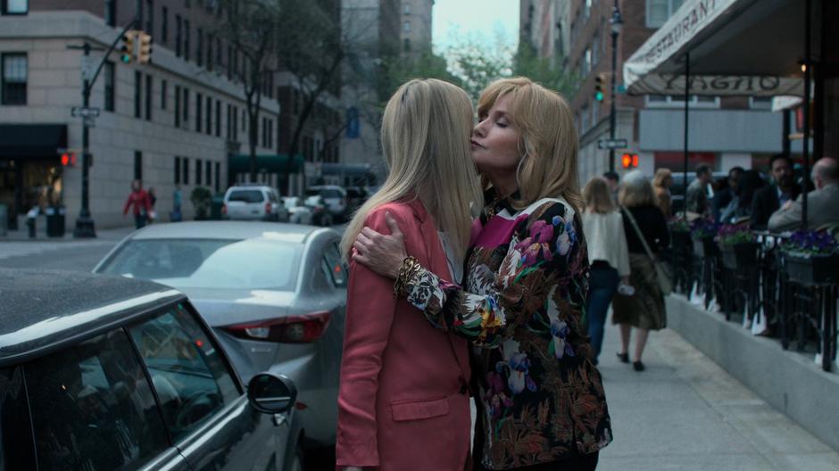 Dorothy kisses Trish goodbye as they part ways outside the restaurant.