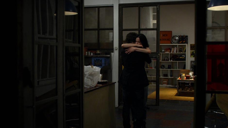 Jessica hugs Stirling after fighting off the guys looking to collect on his debt.