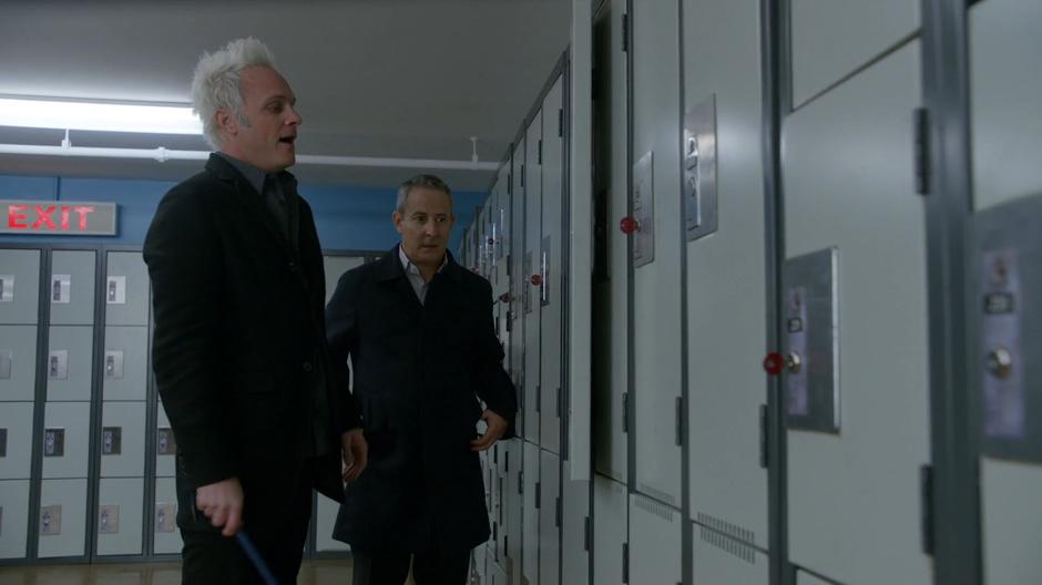 Blaine opens the locker with Stacey Boss but finds it empty.