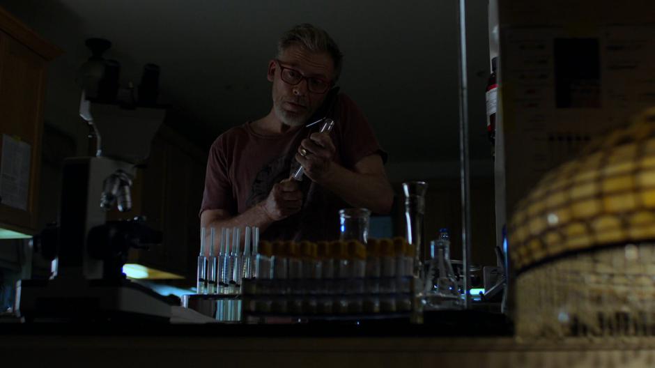 Karl prepares another batch of sedative in his home lab.