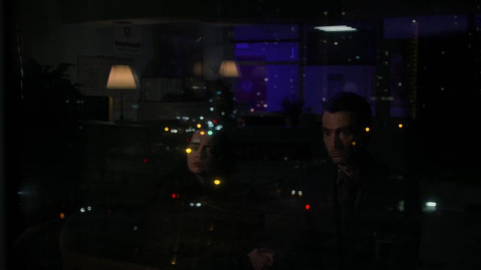 Jessica stares out the window with the vision of Kilgrave.
