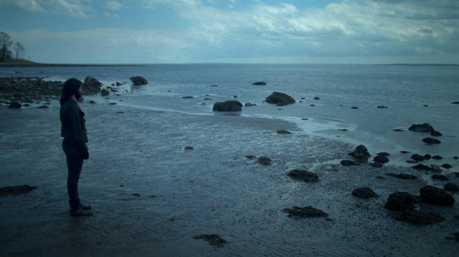 Jessica looks out over the water after disposing of Simpson's body.