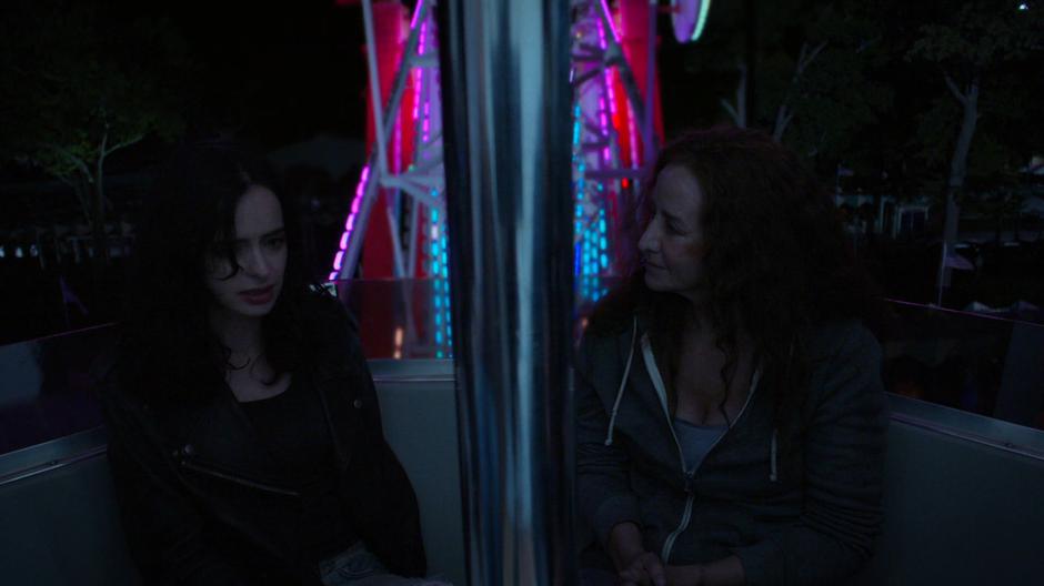 Jessica and Alisa talk while riding around the ferris wheel.