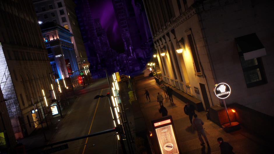 Captain Singh runs out of the coffee shop through paniced people as the city is engulfed in a strange purple darkness.