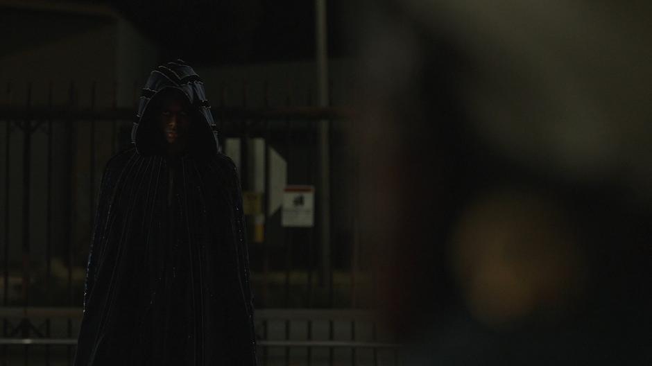 Tyrone appears behind Connors wearing his brother's cloak.
