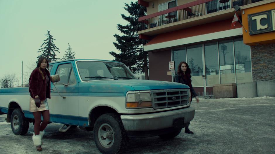 Waverly and Wynonna get out of the truck the morning after their Revenant hunt.