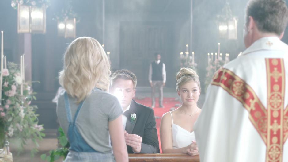 Tyrone watches as the real Tandy tries to take Liam's hopes while Liam kneels with the vision Tandy to be married.