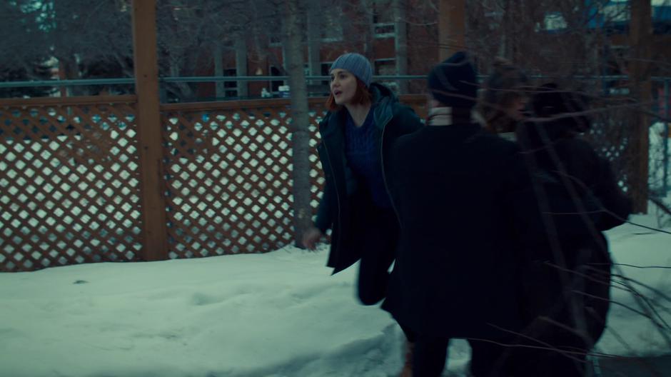 Nicole runs off after the thief after Waverly's bag was stolen.