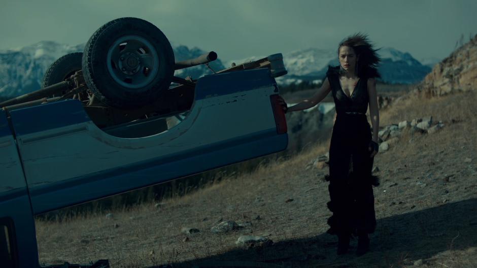 Wynonna walks around the side of the crashed truck looking for any sign of Waverly.