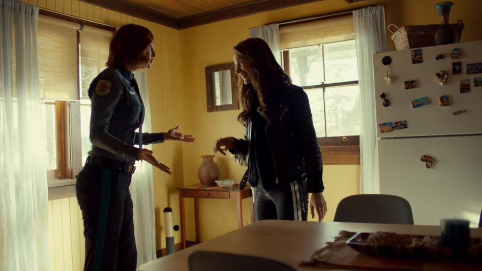Nicole and Wynonna argue in the kitchen.