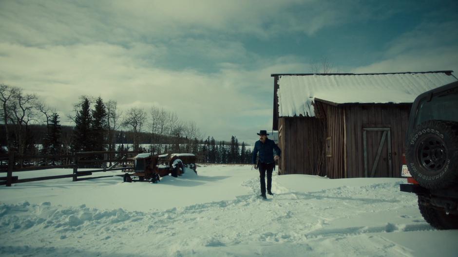 Doc walks out of the barn towards his car where Jolene is waiting.