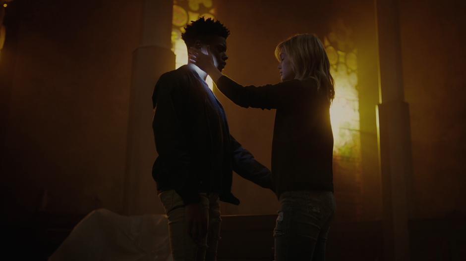Tyrone and Tandy reach towards one another as their powers start to activate.