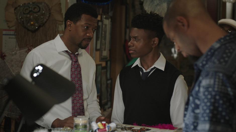 Otis explains the importance of the beads to Tyrone.