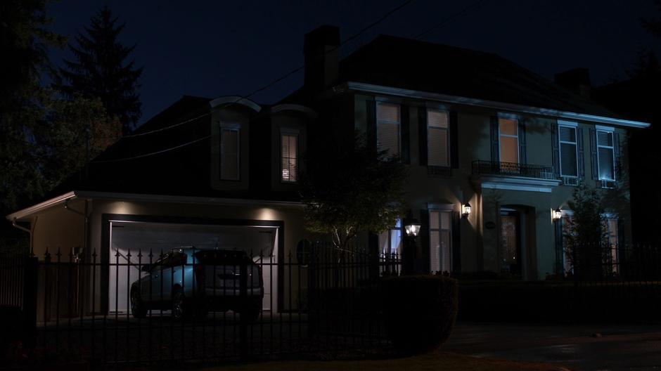 Establishing shot of the house at night.