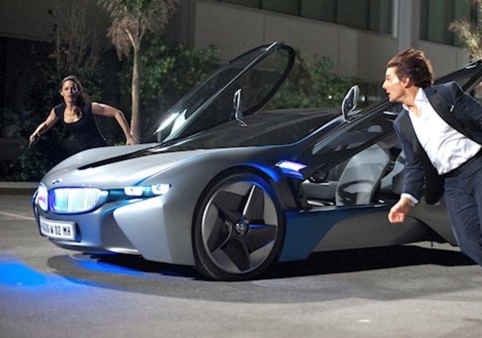 Ethan Hunt jumps out of his BMW super car in front of the Sun Networks headquarters.