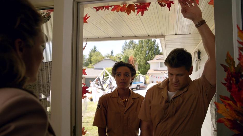 Amaya and Nate talk to Ray's mom while disguised as Animal Control agents.