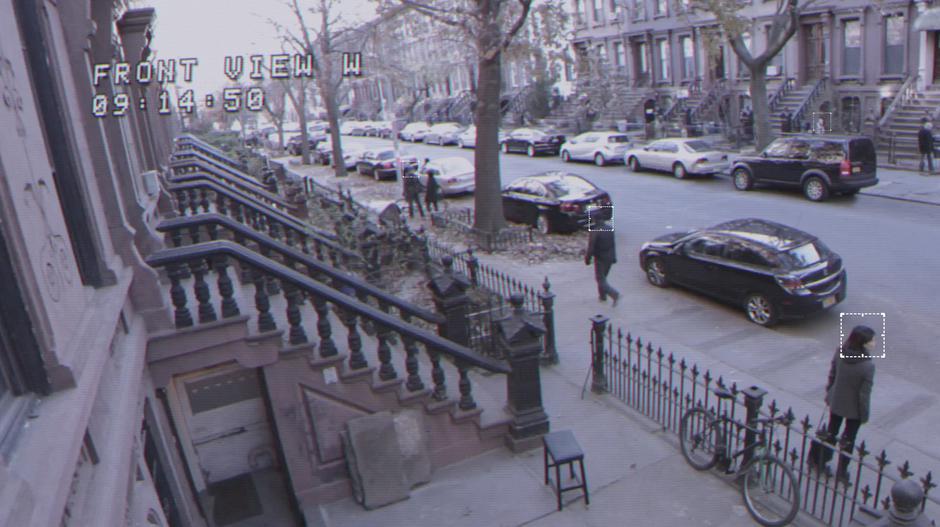 Security camera footage of the street in front of the apartment.