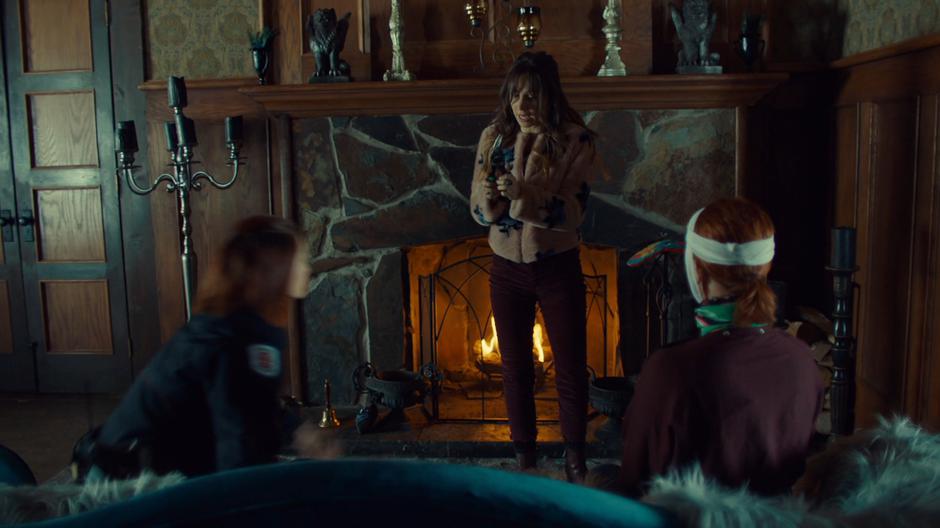 Nicole hops up as Waverly pulls out a pair of snips to take off her finger.