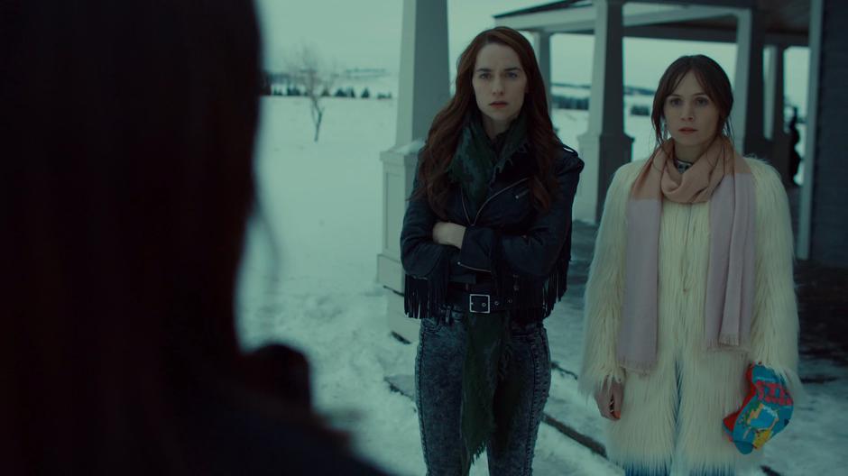 Wynonna and Waverly listen while Kevin explains what Nicole needs to do to save the world.