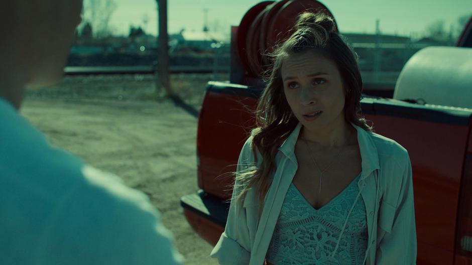 Waverly stops and turns to Charlie in front of his truck to talk about leaving town.