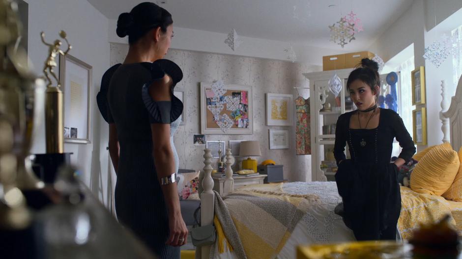 Tina confronts Nico who she found in her sister's room.