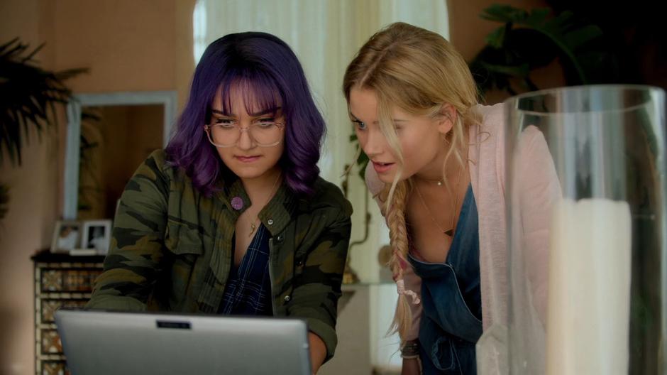 Gert and Karolina examine Leslie's laptop and find an encrypted file marked Ultra Project.