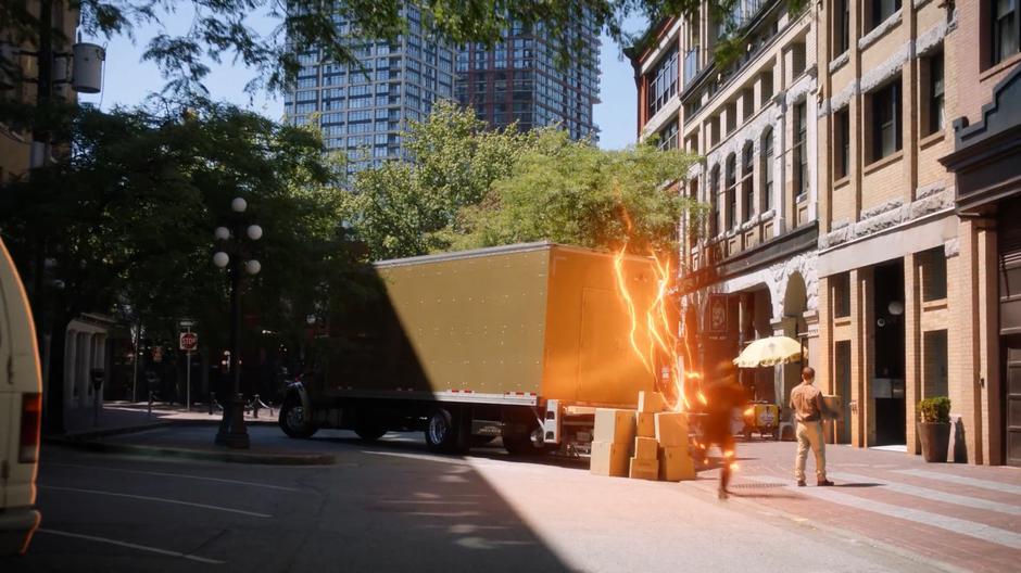 Barry runs over the top of a stopped truck.