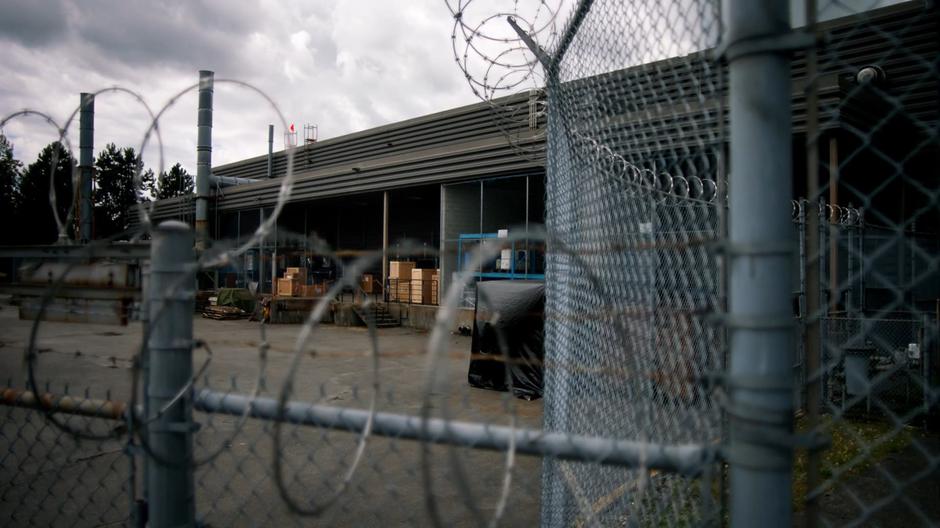 Establishing shot of the exterior of the warehouse.