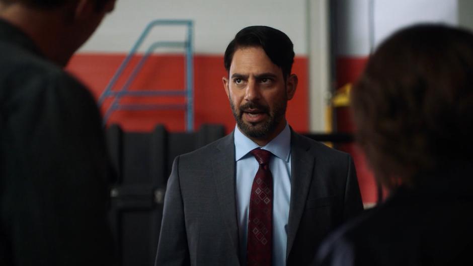 Captain Singh questions Barry about Nora's presence.