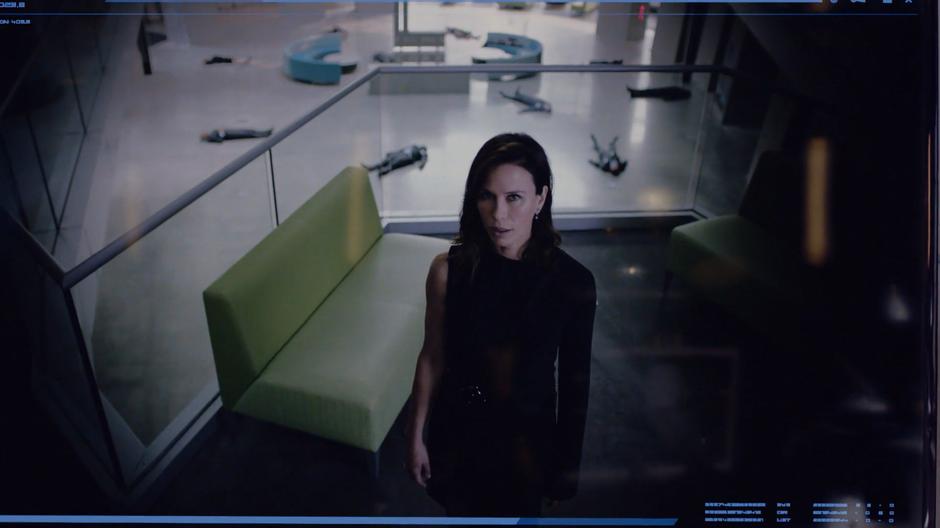 Mercy addresses Lena through a camera in the lobby.