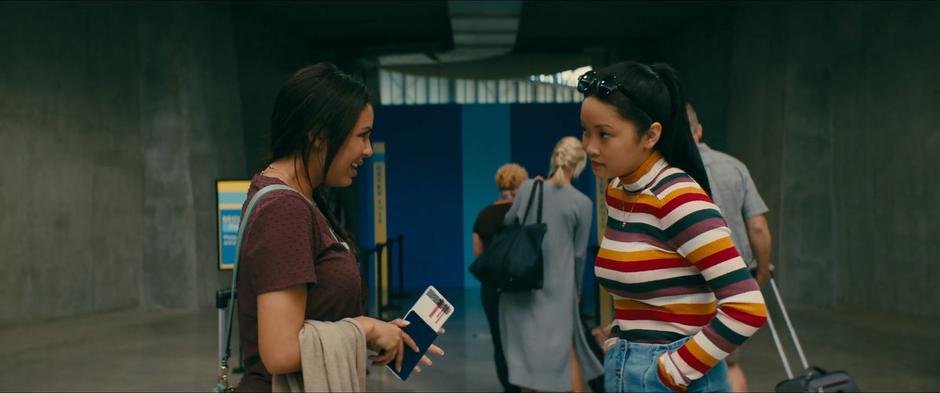 Margo and Lara Jean say their goodbyes outside security.