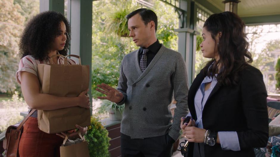 Harry tries to explain himself to Macy while Mel watches him with a satisfied look on her face.
