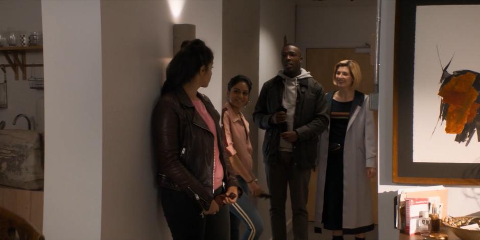 Sonya pops out from her bedroom to greet Yasmin, Ryan, and the Doctor.