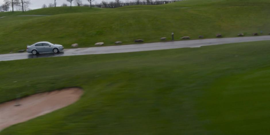 Yasmin drives across the golf course to pick up her mother.