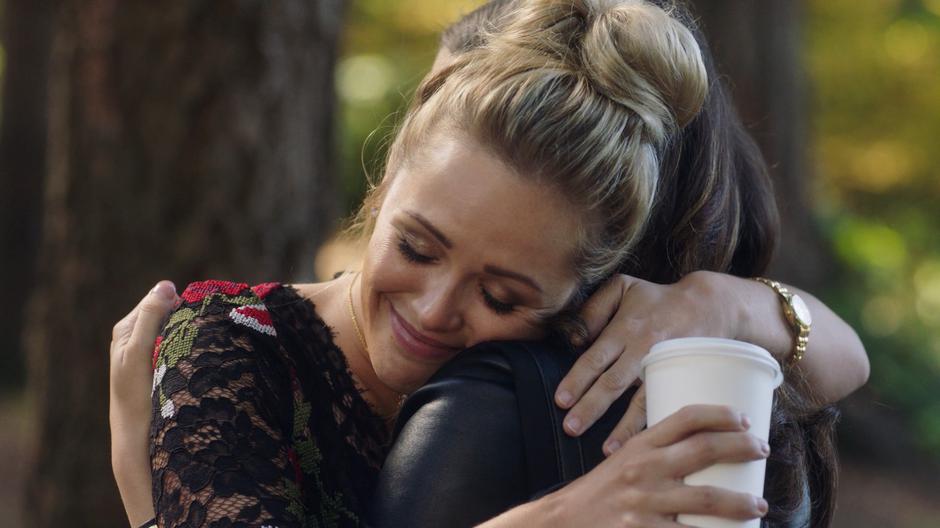 Lucy hugs Maggie after asking for her help.