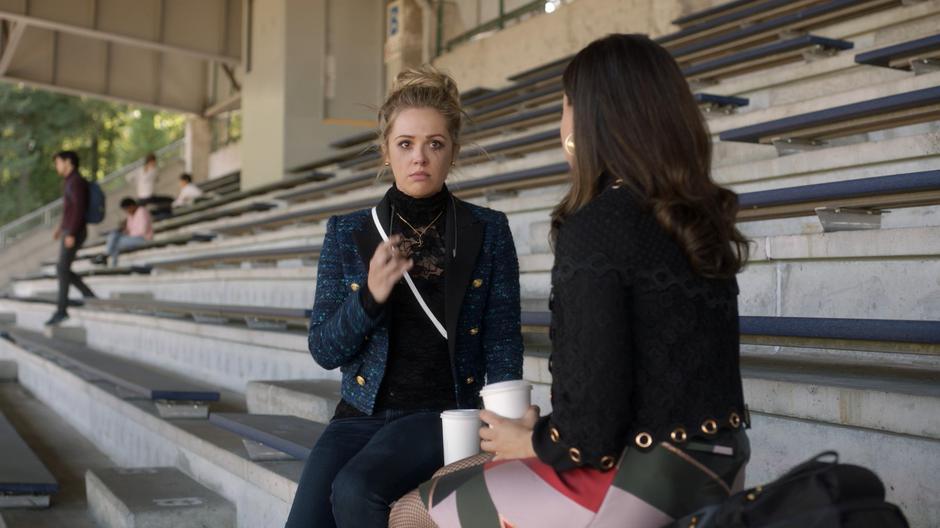 Lucy takes off her sunglasses to reveal her running mascara to Maggie.