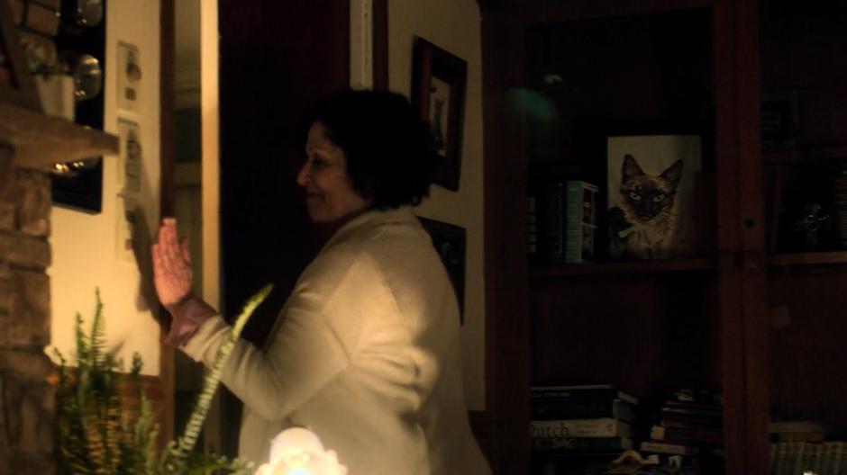 Graciela Aguirre turns off the lights as she leaves Molly's room.