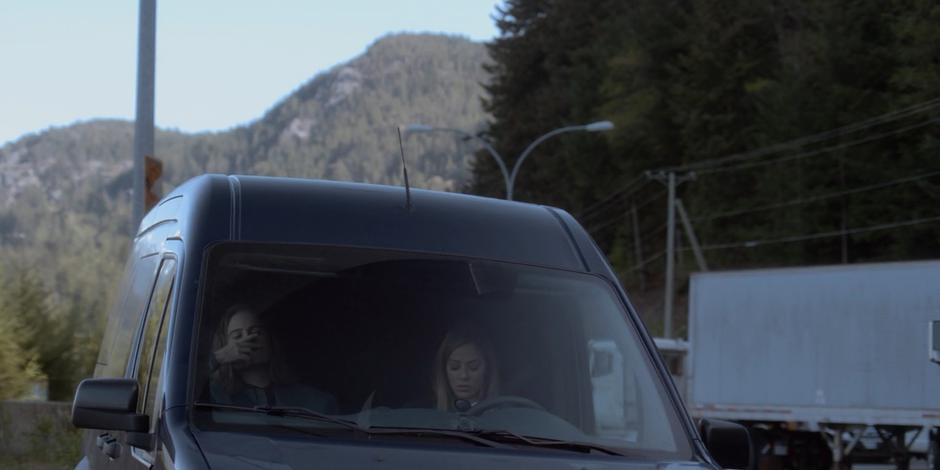 Philip and Carly sit in their van outside the diner waiting for Grant to emerge.