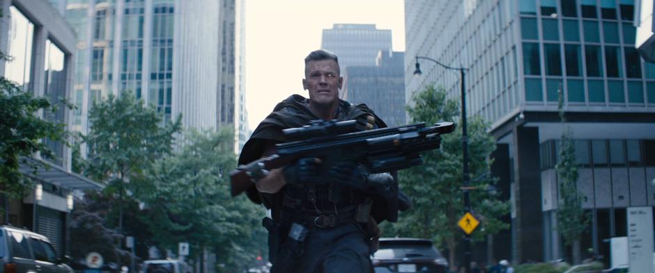 Cable races towards the approaching convoy wih his giant gun.