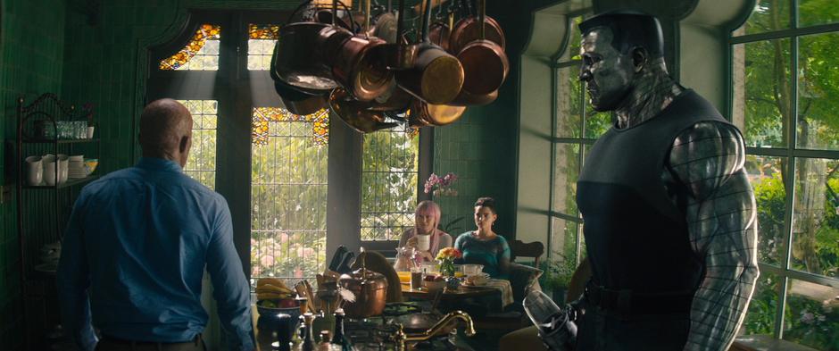 Wade enters the kitchen with Colossus where Yukio and Negasonic Teenage Warhead are eating breakfast.