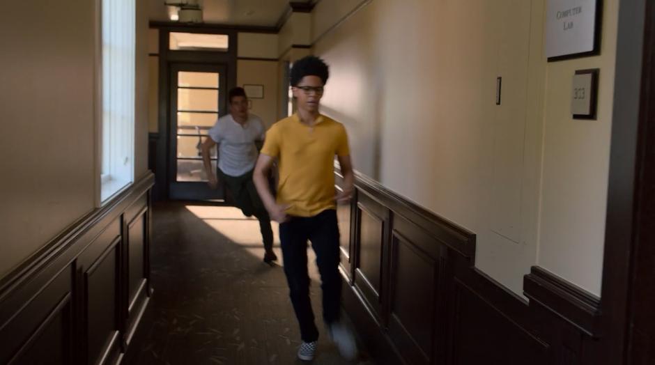 Chase and Alex run down the hallway to the computer lab.